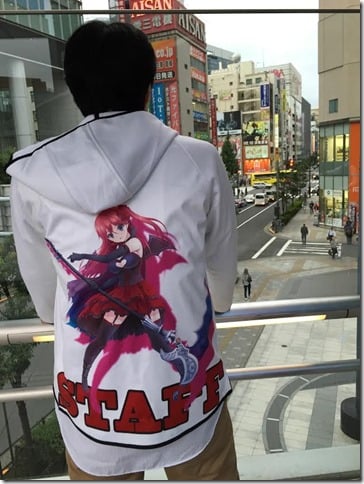 XERO’s Sugawara-san (Chief of Ads and Sales) overlooking the streets of Akihabara as he dons a special staff jacket featuring Lycoris.