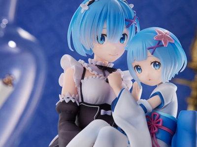 A new Re:Zero Rem figure is coming out in 2023, and it features her holding a younger version of herself as a child.