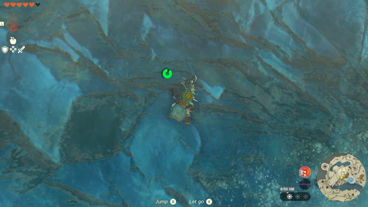 A screenshot of Link climbing an ice wall in Tears of the Kingdom.