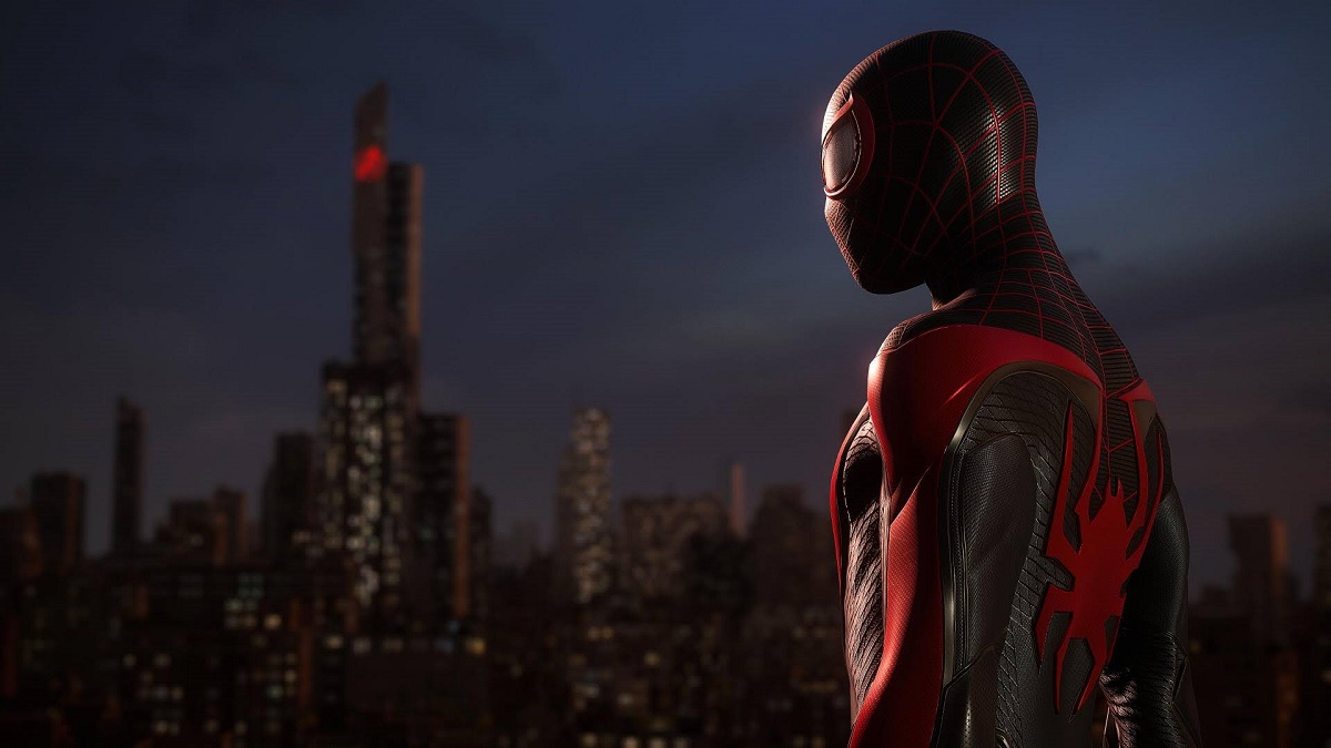Miles Morales stands in front of Avengers Tower in Marvel's Spider-Man 2