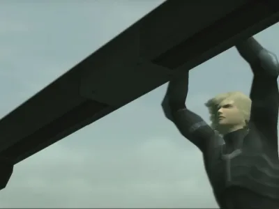 Raiden hangs from a railing in Metal Gear Solid 2