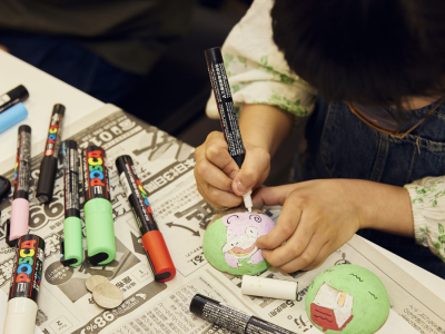 Poke Ball design workshop at Tama Art University Bureau - Japanese grade school student drawing a Slowpoke ball